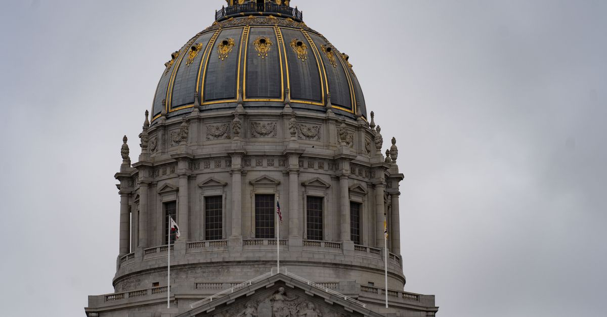 Closeup of San Francisco City Hall's dome showcasing neoclassical architecture.