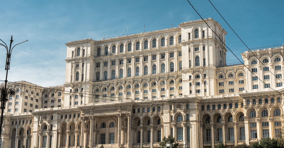 Capture of the iconic Palace of the Parliament in Bucharest, Romania under clear skies.