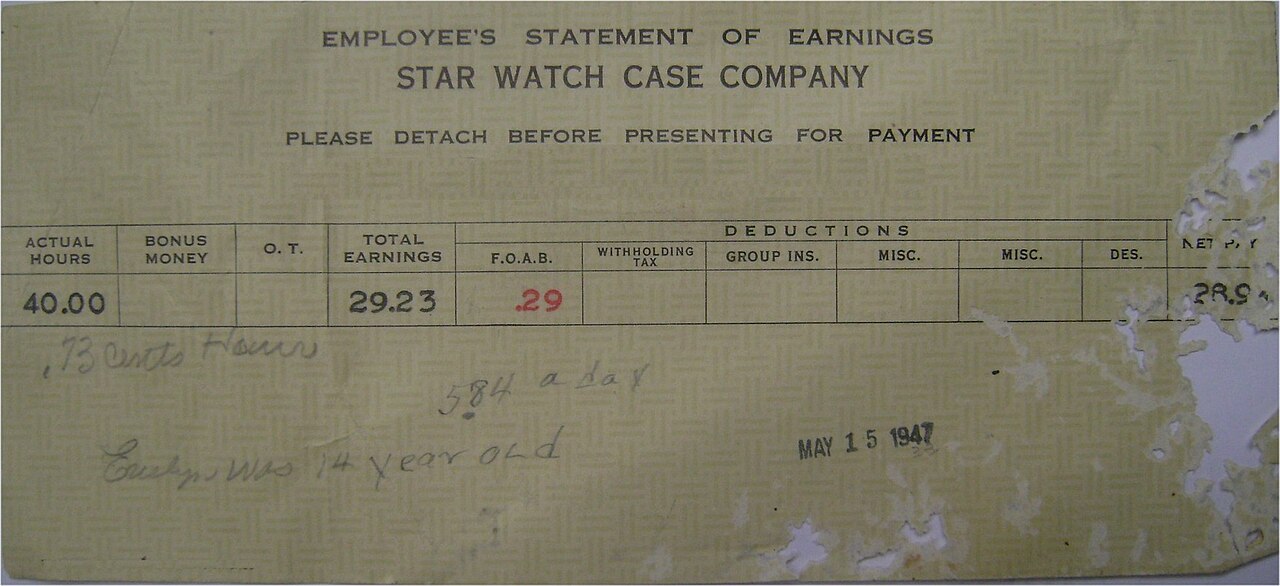 A printed pay stub